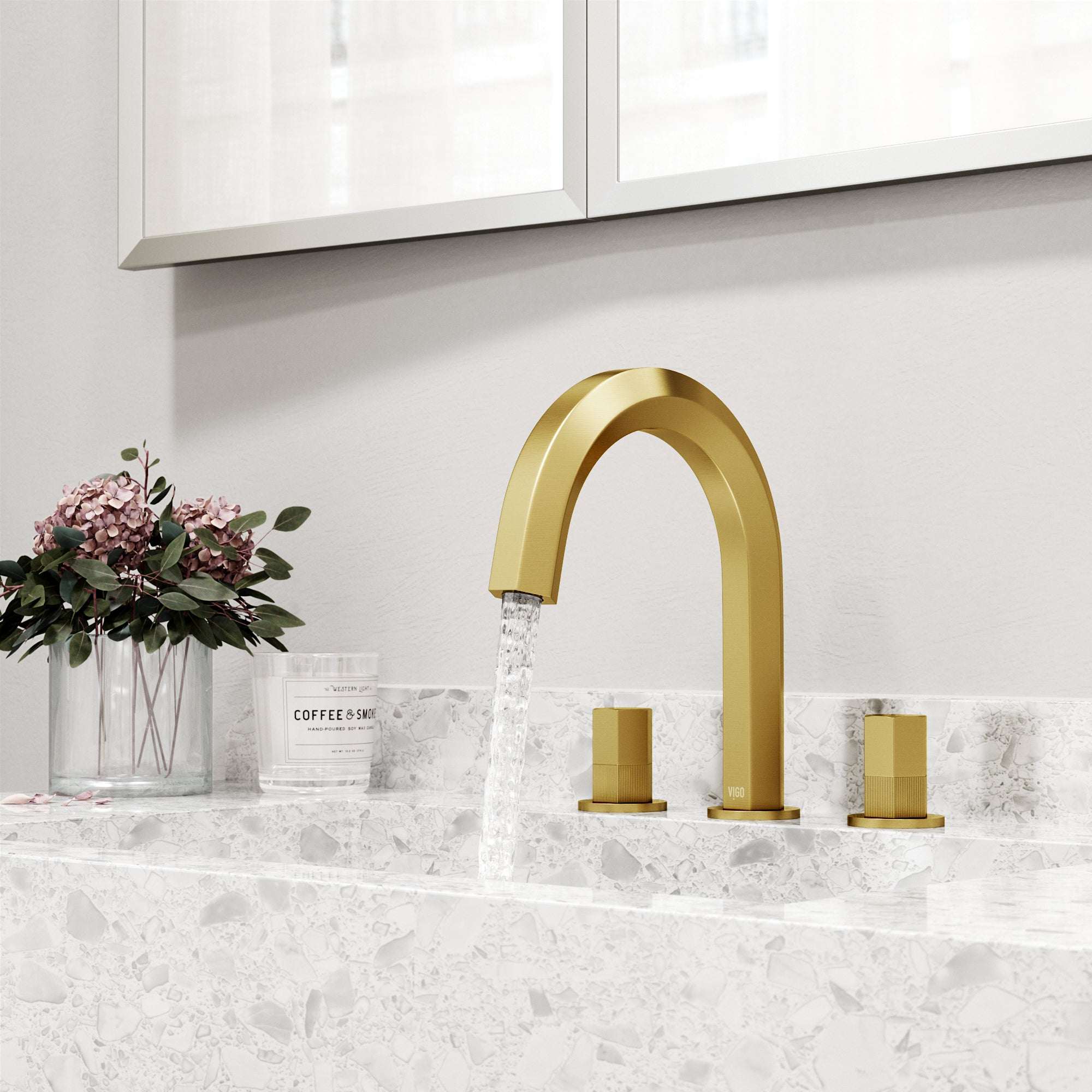 Low lead matte brushed gold faucet featuring waterfall spout and easy installation