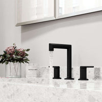 Mid arc spout faucet in matte black with included mounting hardware and supply lines