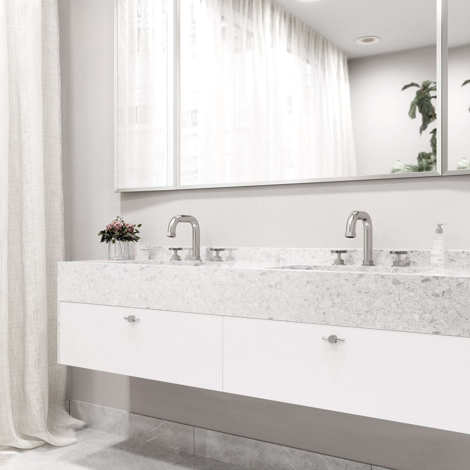 Contemporary widespread faucet with hot/cold indicators and waterfall flow