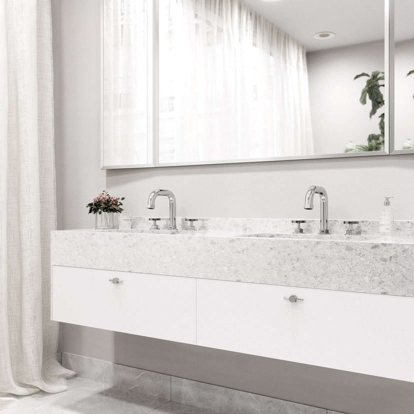Contemporary widespread faucet with hot/cold indicators and waterfall flow