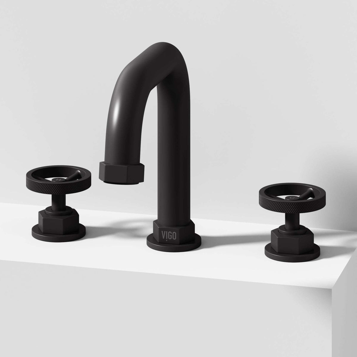 Matte black widespread bathroom faucet with high arc spout and ceramic disc valve