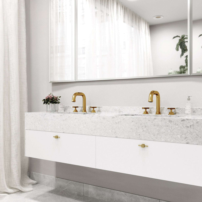 Contemporary widespread faucet with hot/cold indicators and waterfall flow
