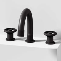 Matte black widespread bathroom faucet with high arc spout and ceramic disc valve