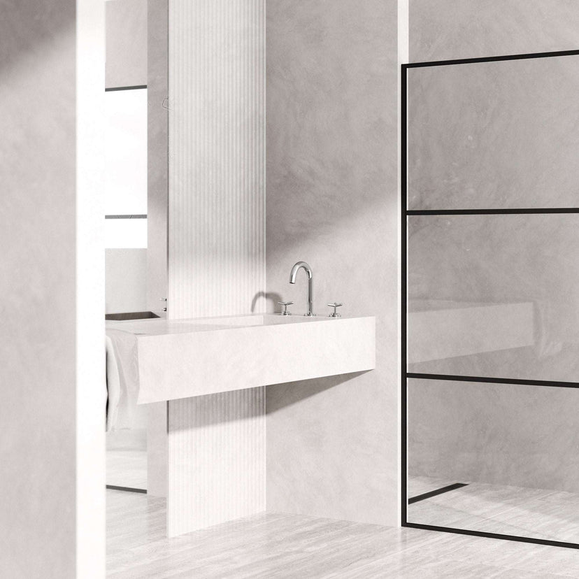 Widespread bathroom faucet featuring waterfall flow and brushed nickel finish
