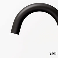 Widespread bathroom faucet featuring waterfall flow and matte black finish