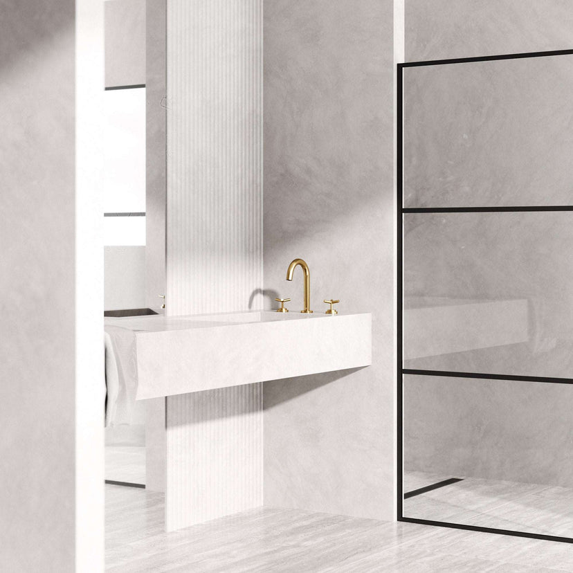Widespread bathroom faucet featuring waterfall flow and matte brushed gold finish