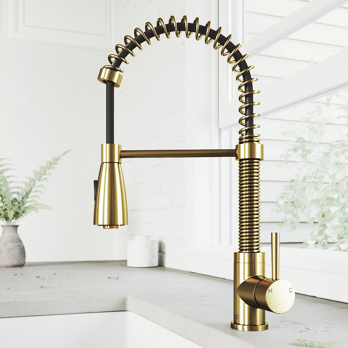 Matte brushed gold kitchen faucet with pull-down sprayer and gooseneck spout