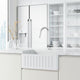 Touchless single handle faucet with high-arc spout and included supply lines