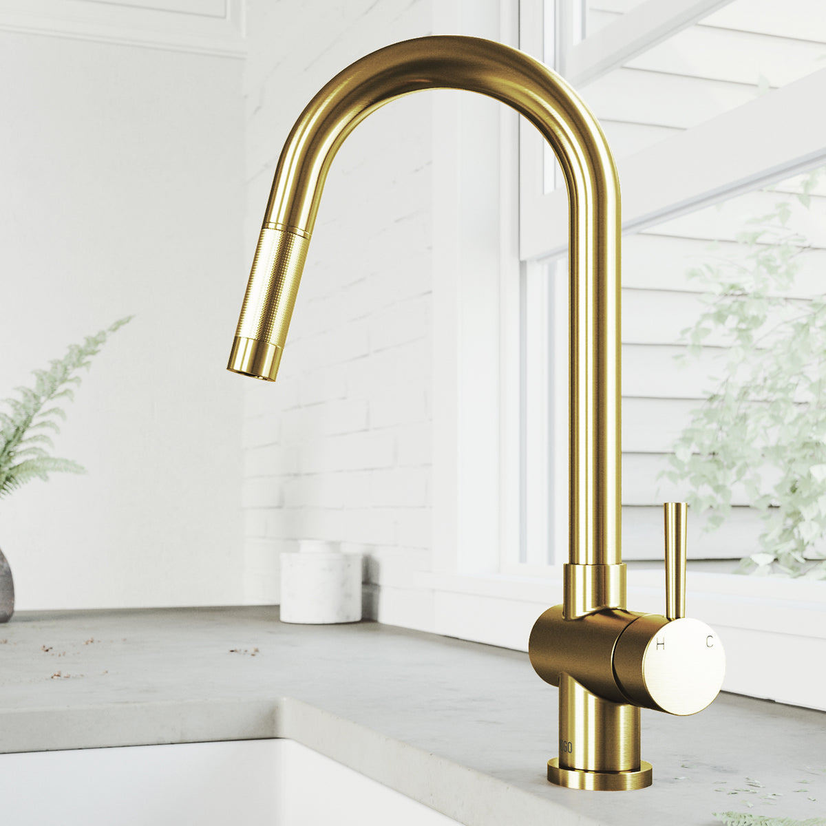 Matte brushed gold single handle kitchen faucet with pull-down sprayer and gooseneck spout