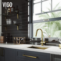 Brass kitchen faucet with matte brushed gold finish and included supply lines