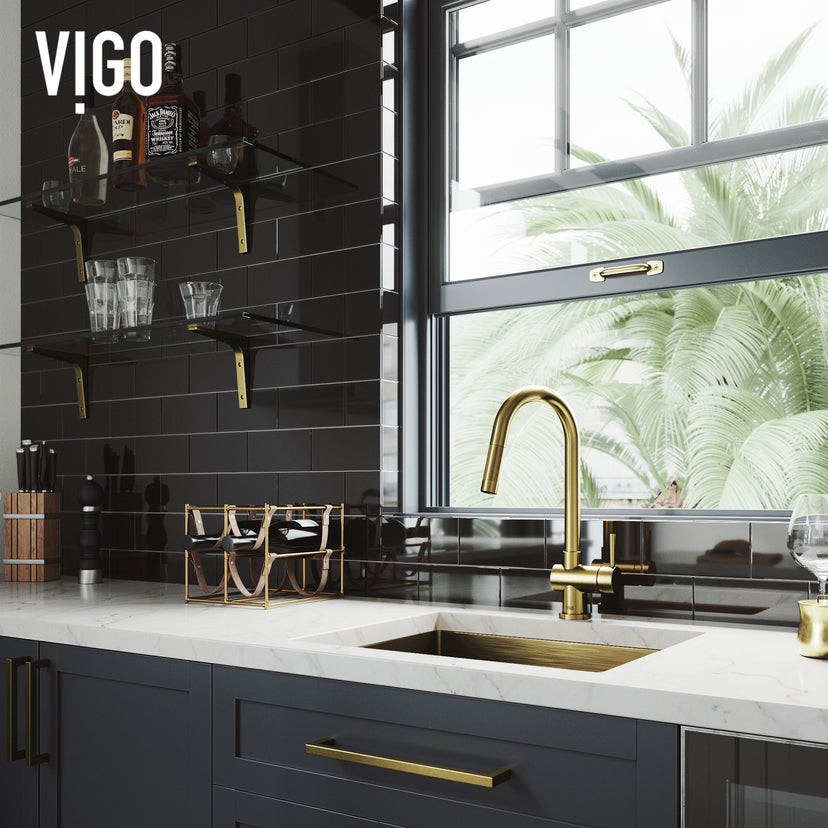 Brass kitchen faucet with matte brushed gold finish and included supply lines
