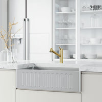 Modern kitchen faucet with included hose and docking technology for sprayer