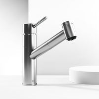 Kitchen faucet with stainless steel finish and secure docking for sprayer head