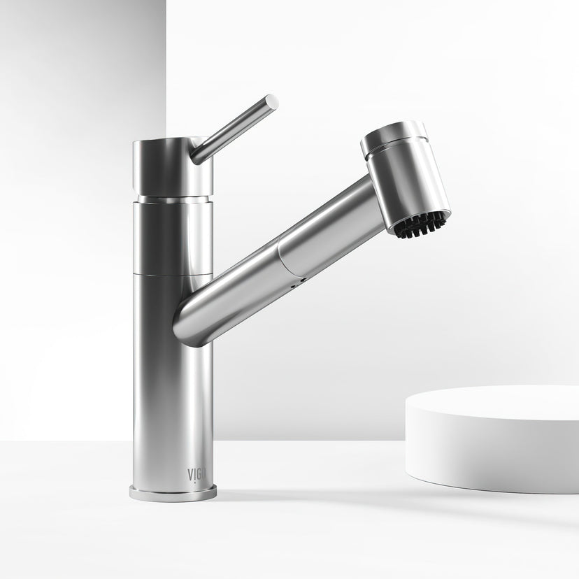 Kitchen faucet with stainless steel finish and secure docking for sprayer head