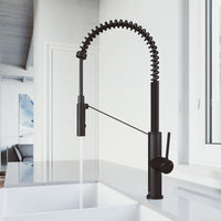 Pull-down kitchen faucet with lever handle, high-arc spout, and spot-resistant finish in matte black