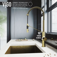 Brass kitchen faucet with magnetic docking, dual-mode sprayer, and modern contemporary style