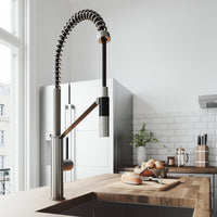 Kitchen faucet with magnetic docking station, pre-rinse function, and stainless steel finish