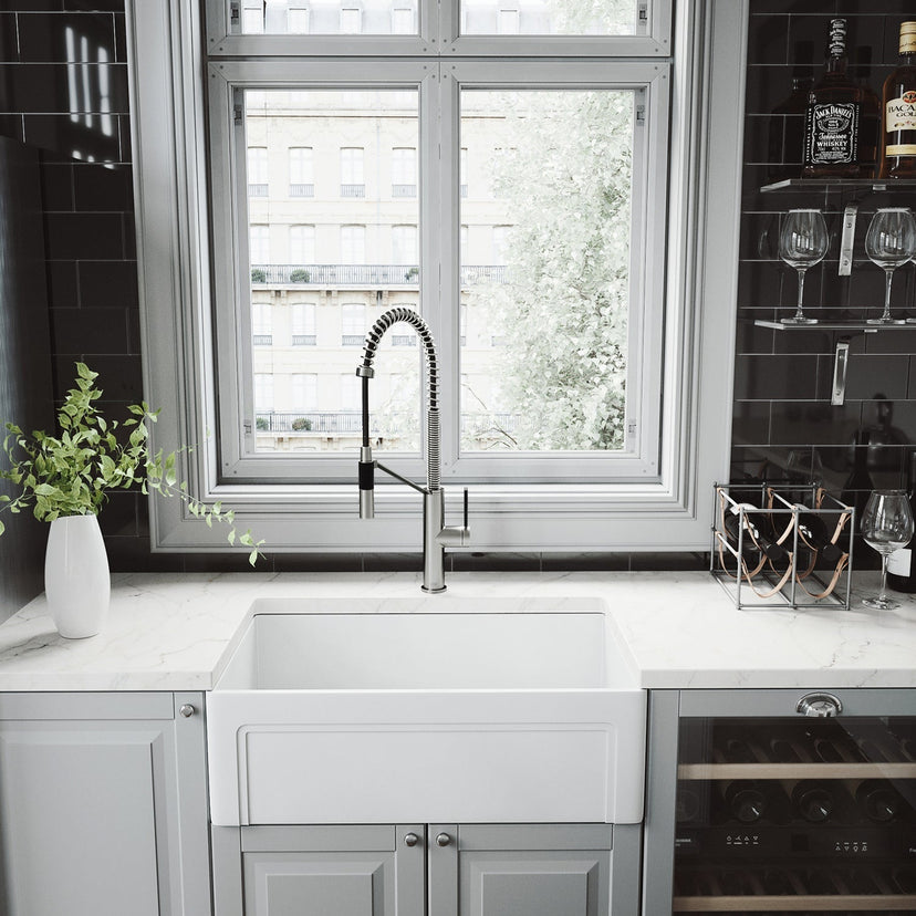 Water-efficient kitchen faucet with high-arc gooseneck spout and ceramic disk valve