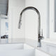 Chrome pull-down kitchen faucet with high-arc gooseneck spout and lever handle