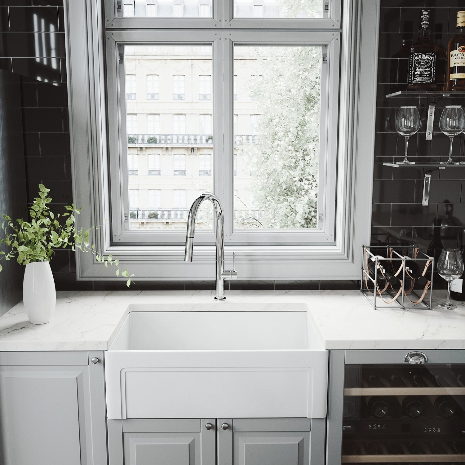 Chrome kitchen faucet with pull-down sprayer, lever handle, and compression connections