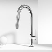 Brass kitchen faucet with high-arc spout and touchless sensor for modern kitchens