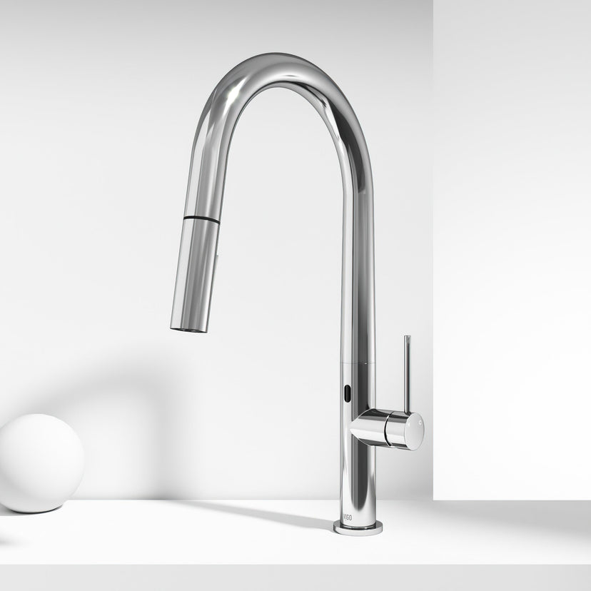 Brass kitchen faucet with high-arc spout and touchless sensor for modern kitchens