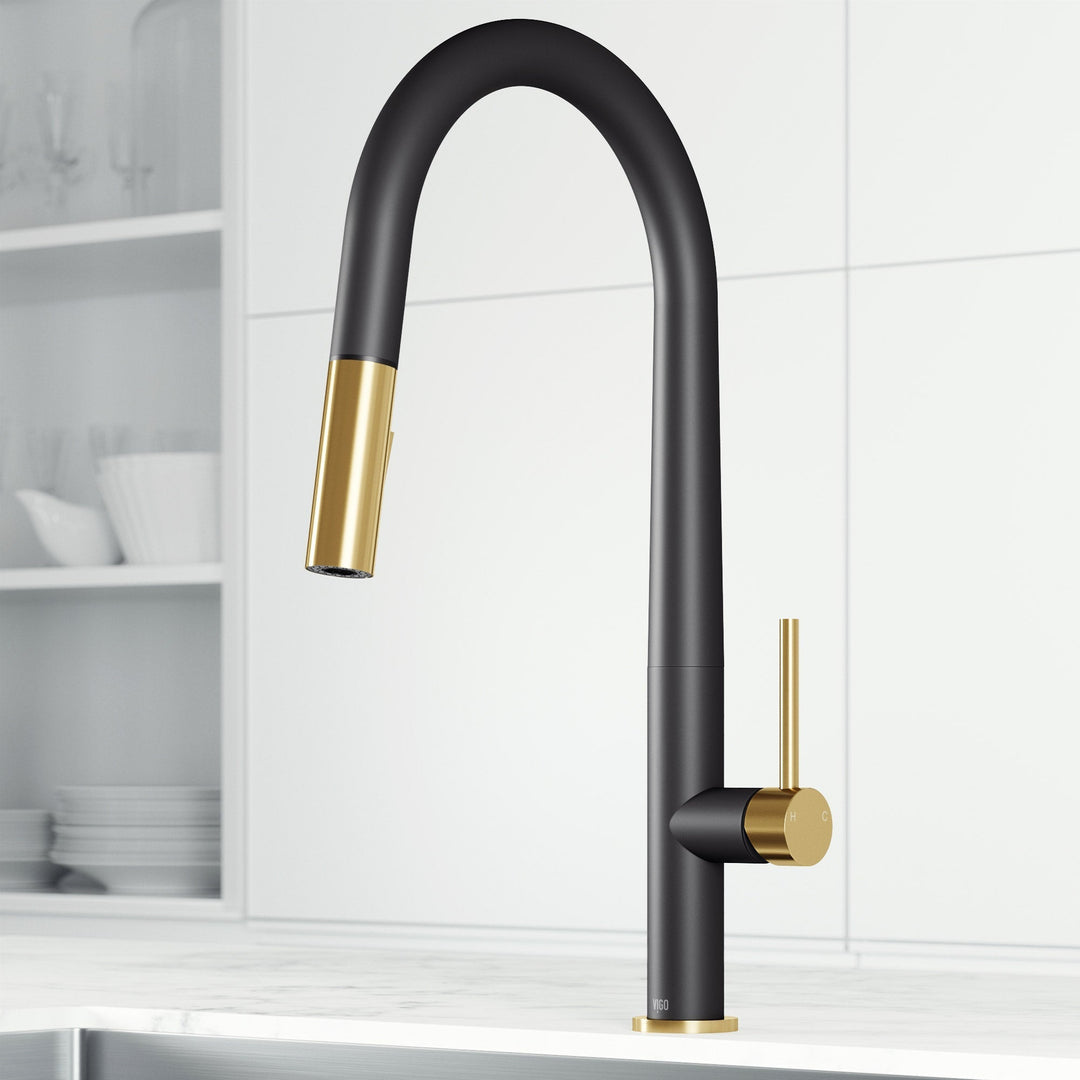 Black and gold pull-down kitchen faucet with high-arc gooseneck spout and lever handle