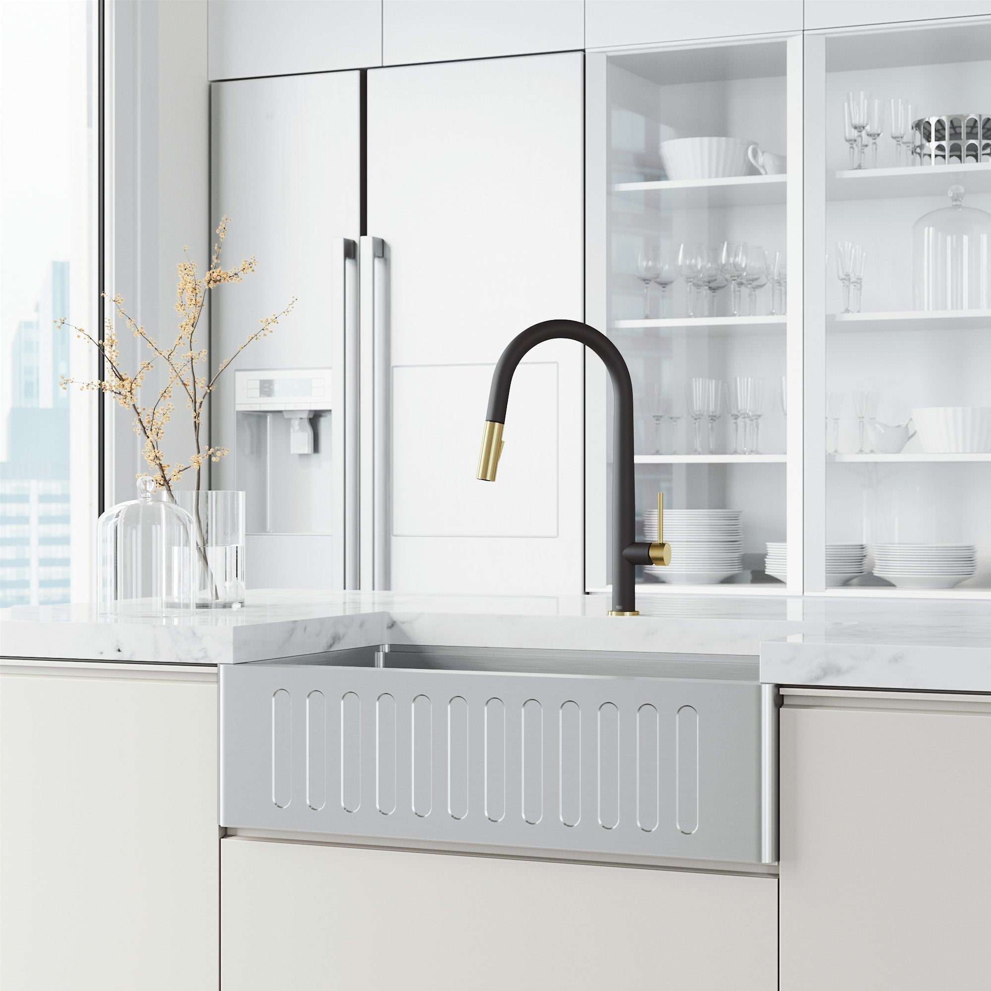 Modern kitchen faucet featuring spot-resistant black and gold and pull-down spray function