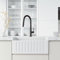 Matte black brass kitchen faucet featuring ceramic disc cartridge and secure docking