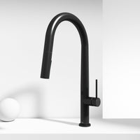 Brass kitchen faucet with high-arc spout and touchless sensor for modern kitchens