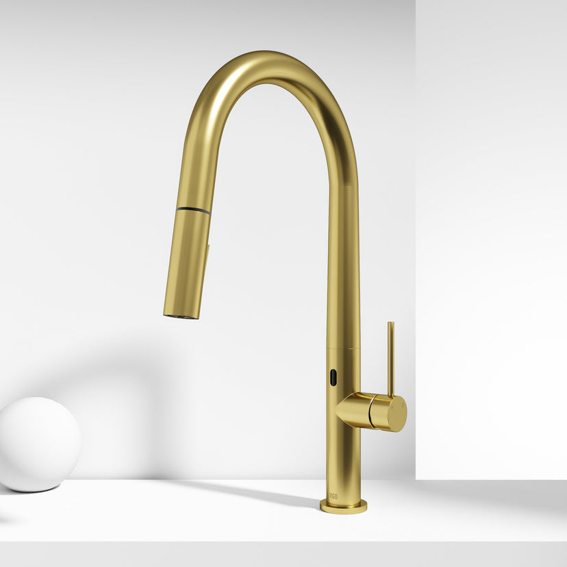 Brass kitchen faucet with high-arc spout and touchless sensor for modern kitchens
