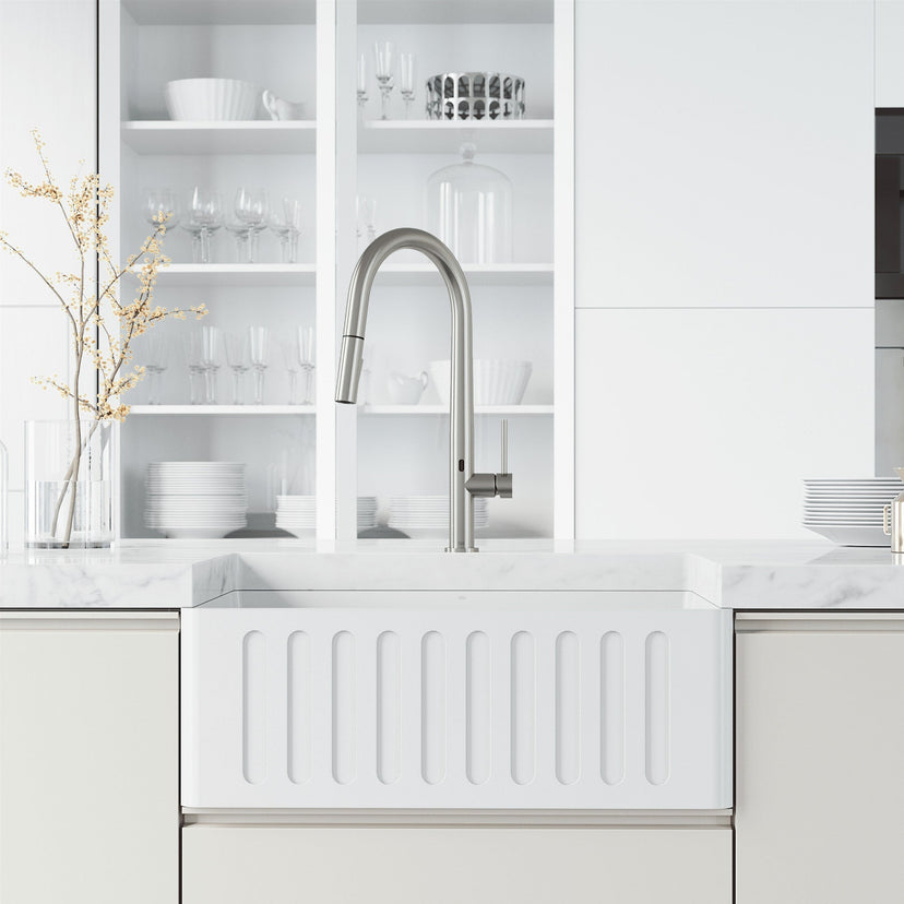 Stainless steel brass kitchen faucet featuring ceramic disc cartridge and secure docking
