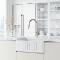 High-arc stainless steel faucet with lever handle and included supply lines and hardware