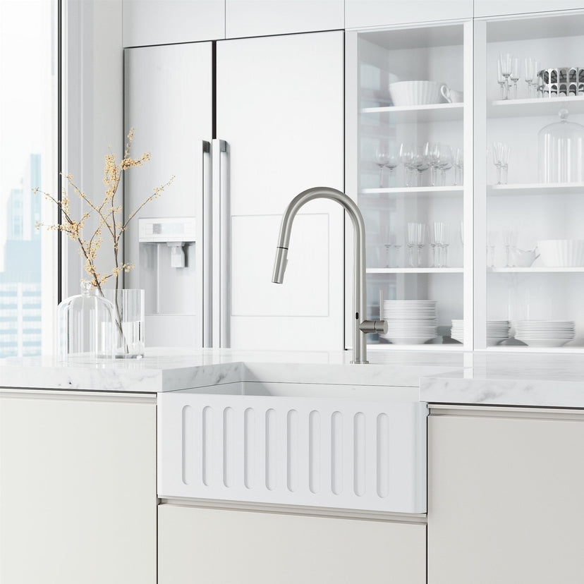 High-arc stainless steel faucet with lever handle and included supply lines and hardware