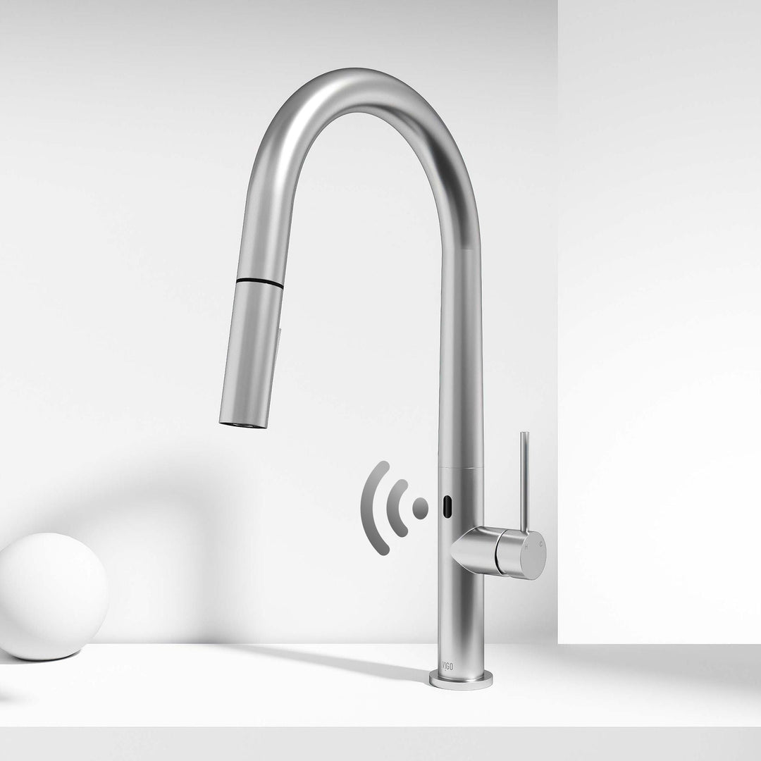 Stainless steel finish faucet with pull-down sprayer and included mounting hardware