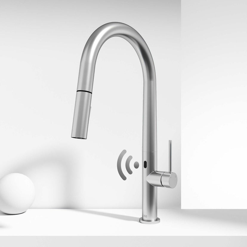 Stainless steel finish faucet with pull-down sprayer and included mounting hardware