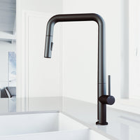 Stainless steel kitchen faucet with matte black finish and ceramic disk valve technology