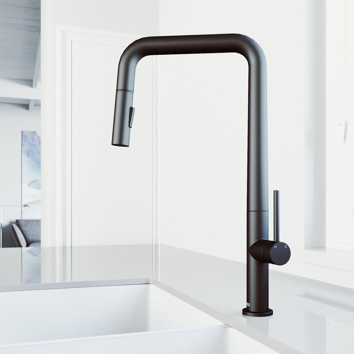 Stainless steel kitchen faucet with matte black finish and ceramic disk valve technology