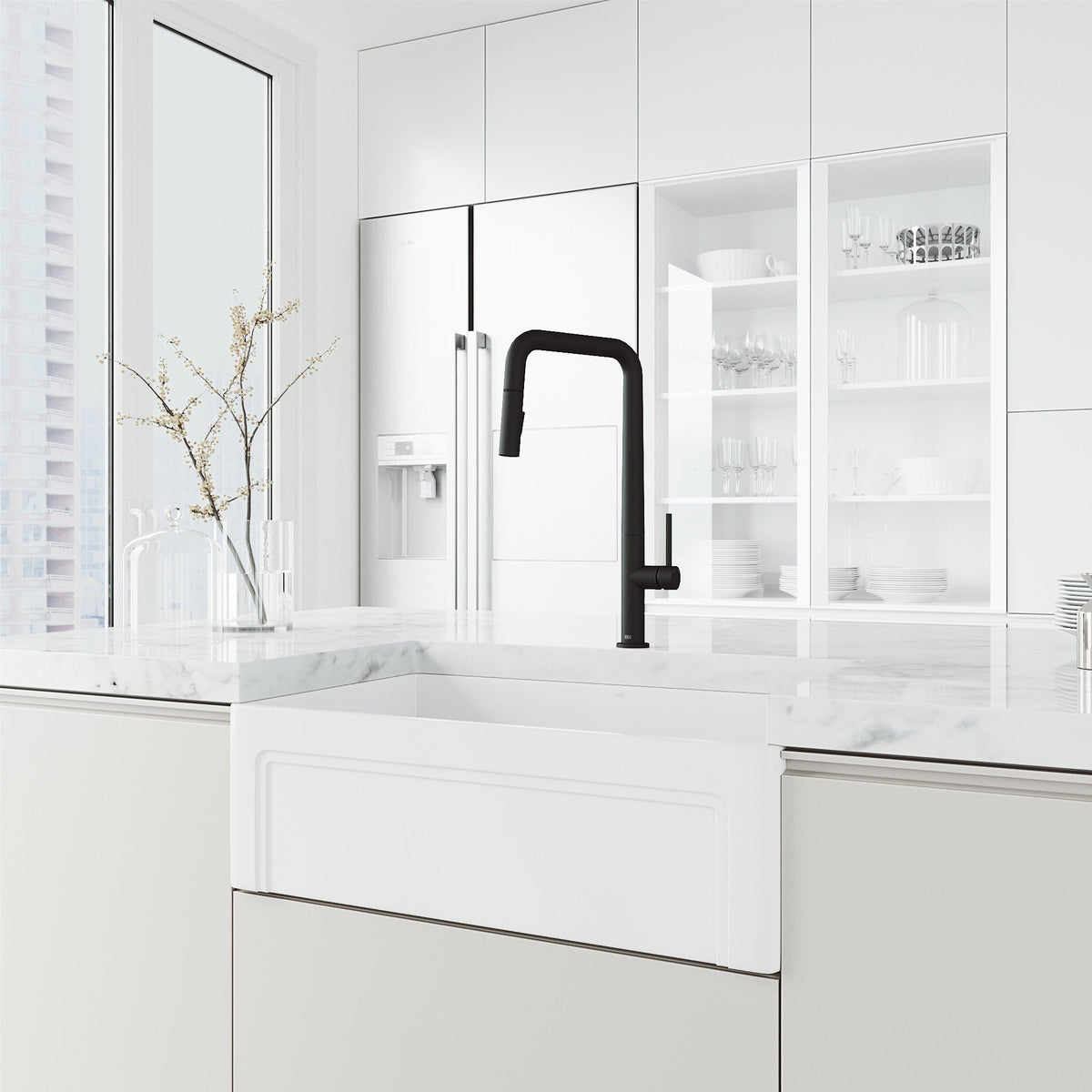 Matte black kitchen faucet with pre-rinse function and included hose and mounting materials
