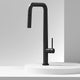 Single handle kitchen faucet featuring secure docking and 360-degree spout rotation