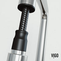 Brass kitchen faucet with lever handle, high-arc spout, and included mounting hardware