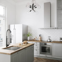 Deck-mounted kitchen faucet with ceramic valve, pull-down sprayer, and matte black finish