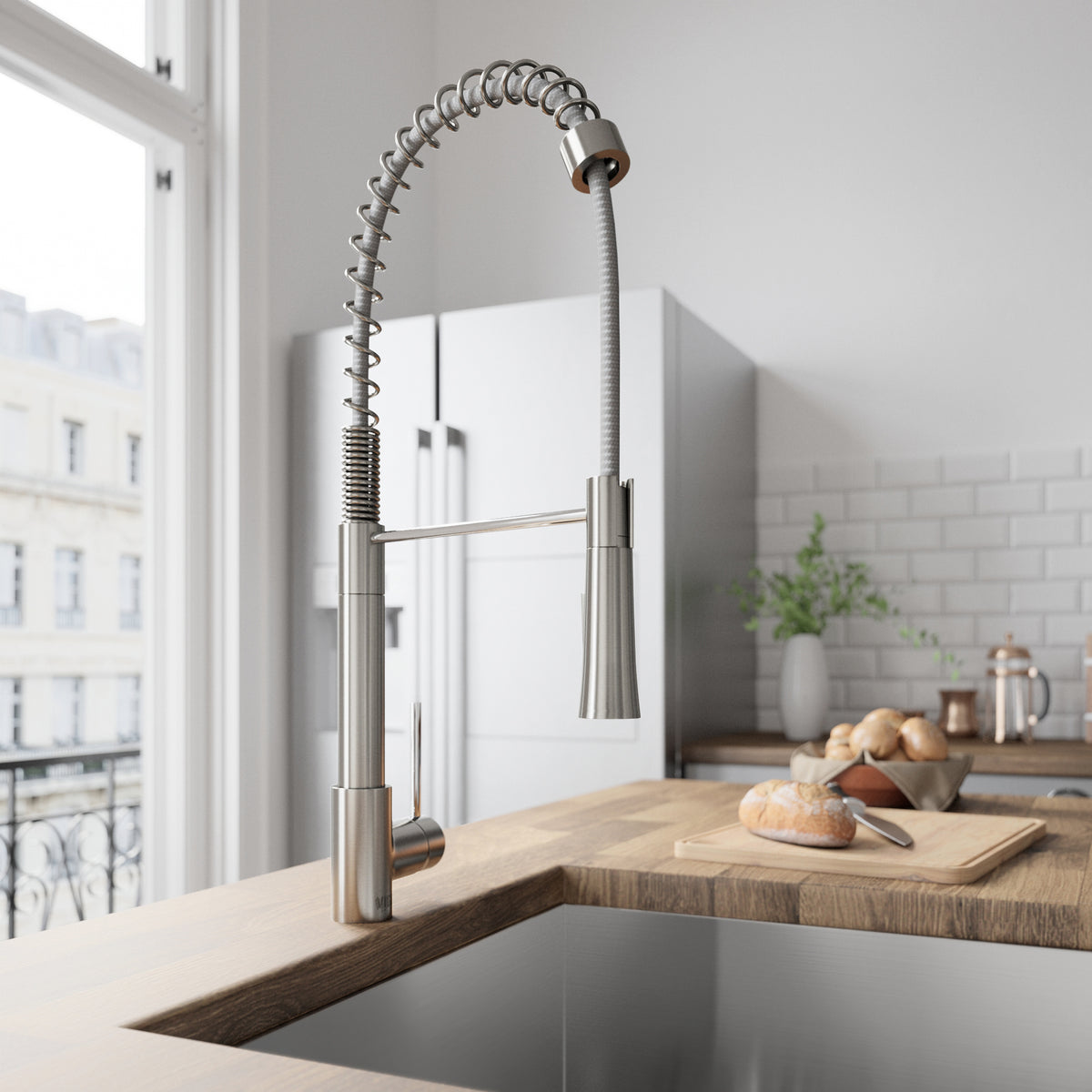High-arc gooseneck kitchen faucet in stainless steel, includes supply lines and mounting hardware