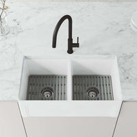 Water-efficient matte black faucet with spot-resistant finish and secure docking