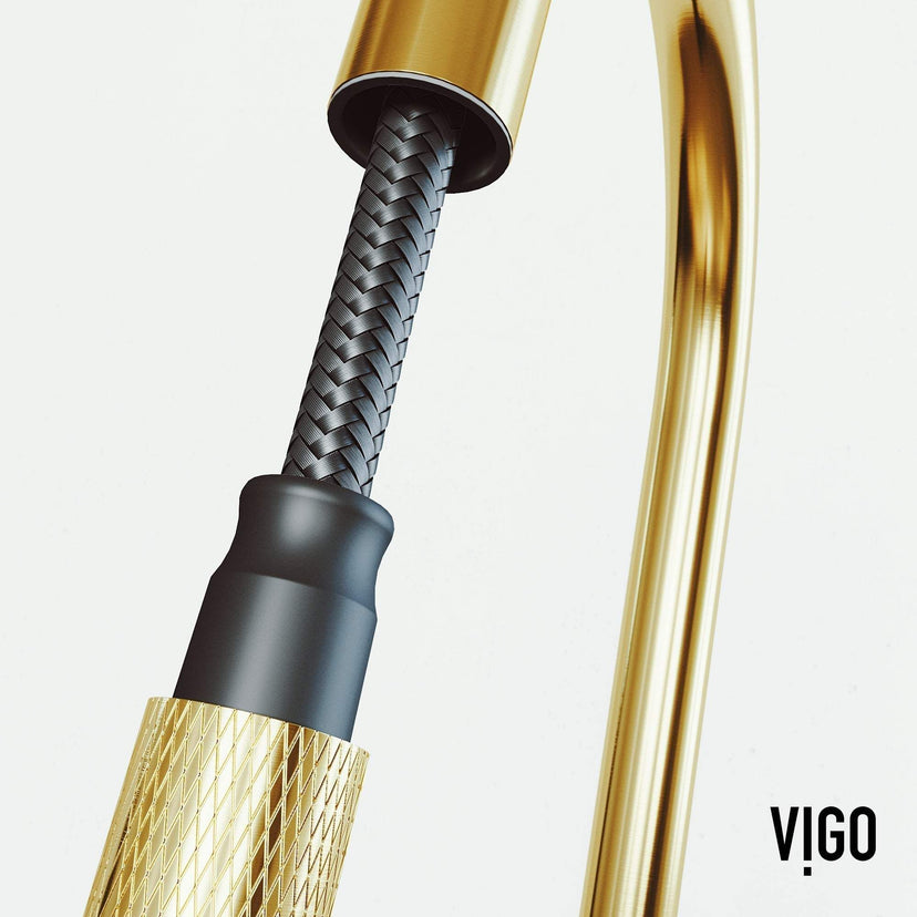 Spot-resistant matte brushed gold faucet with secure docking and pre-rinse