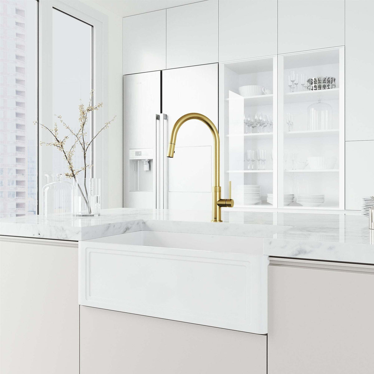 Brass kitchen faucet in matte brushed gold with included hose and sprayer