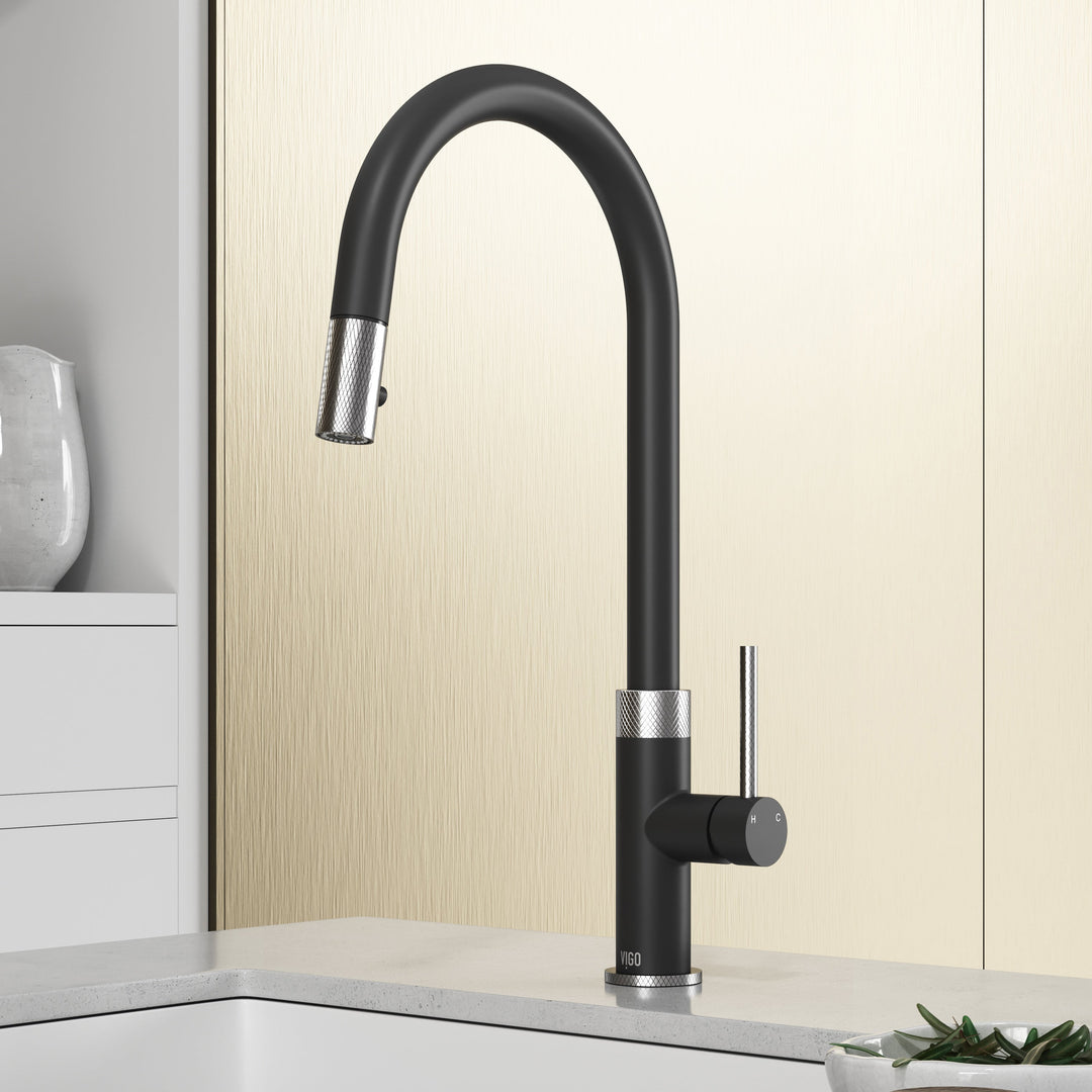 Black and steel pull-down kitchen faucet with high-arc gooseneck spout