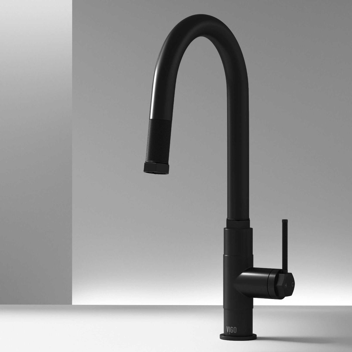 Matte black single handle kitchen faucet with pull-down sprayer and gooseneck spout