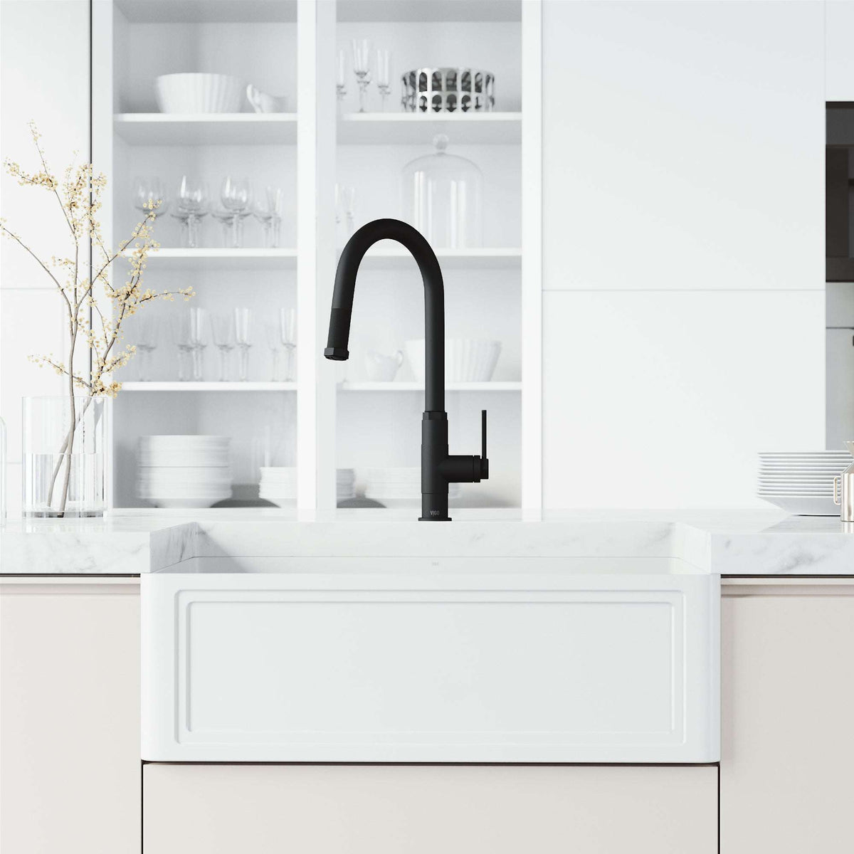 Pull-down kitchen faucet with secure docking station and spot-resistant finish