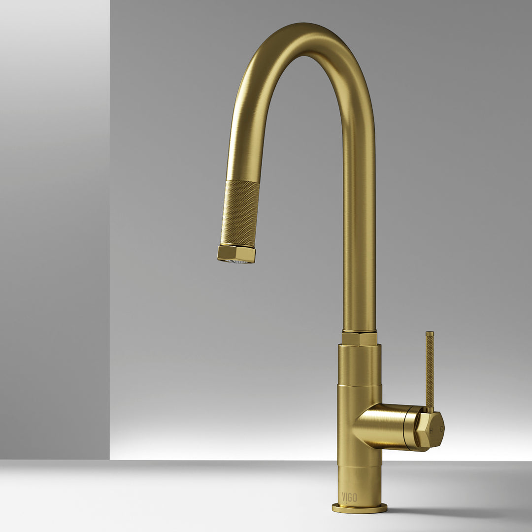 Matte brushed gold single handle kitchen faucet with pull-down sprayer